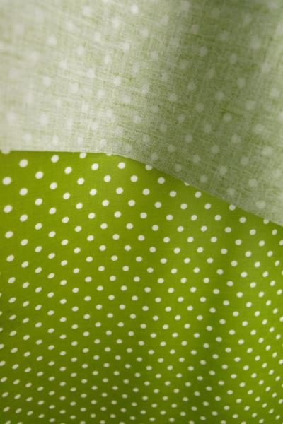 Baumwolle beschichtet Wachstuch Limegrün mit weißen Punkten
